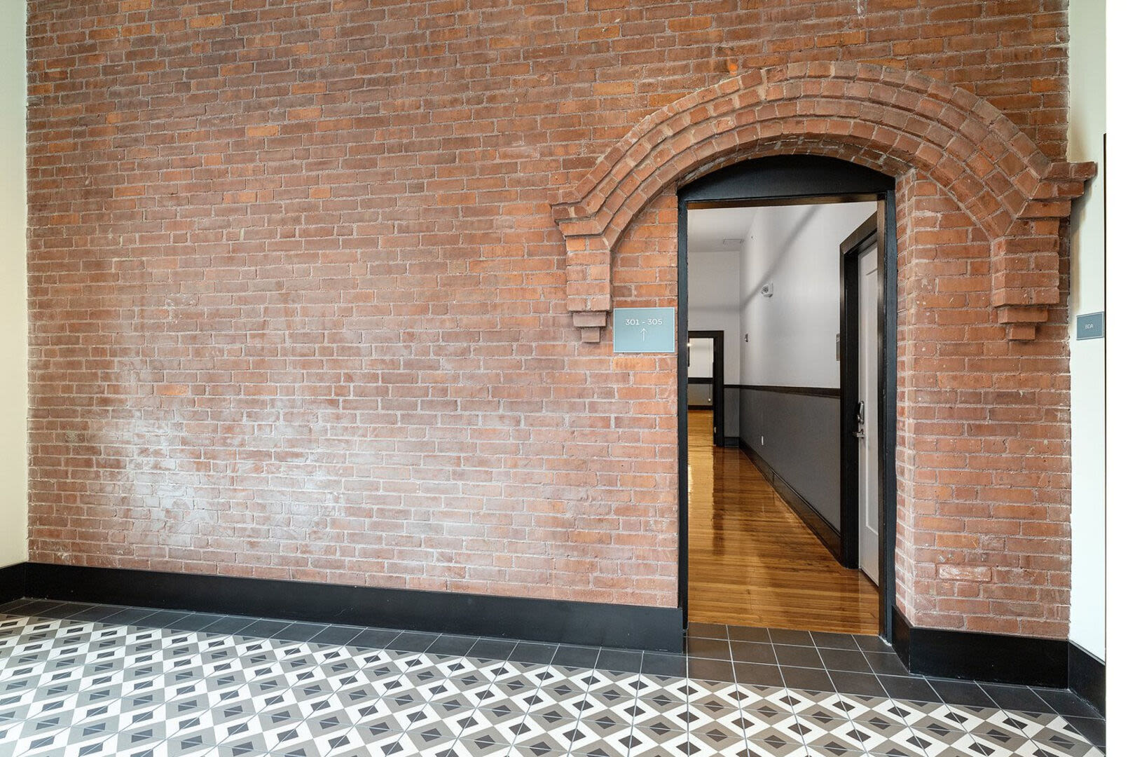 Open door leading to the clubhouse at The Mcelwain School Apartments in Bridgewater,Massachusetts