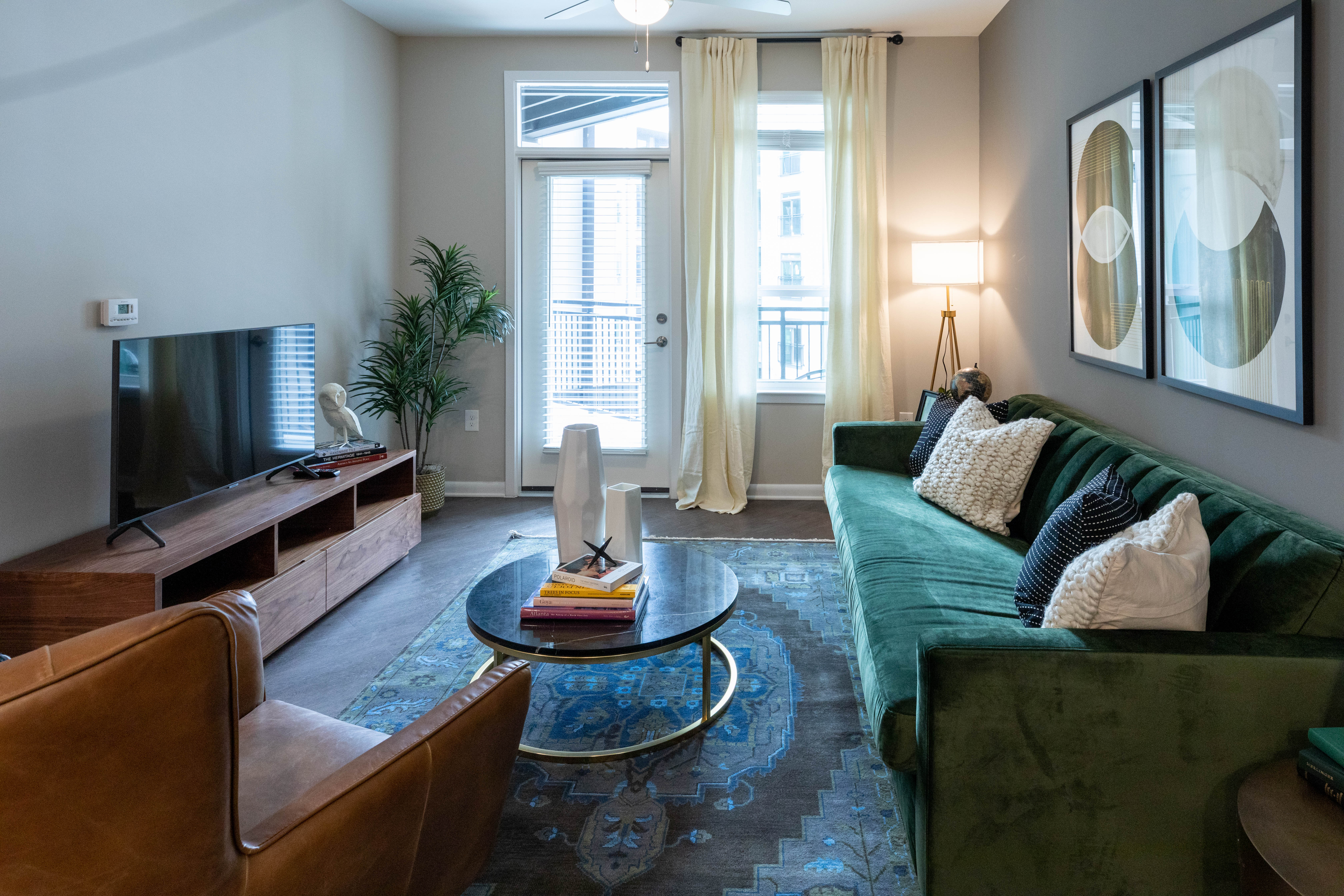 Model living space with carpet The Jade at Avondale in Decatur, Georgia