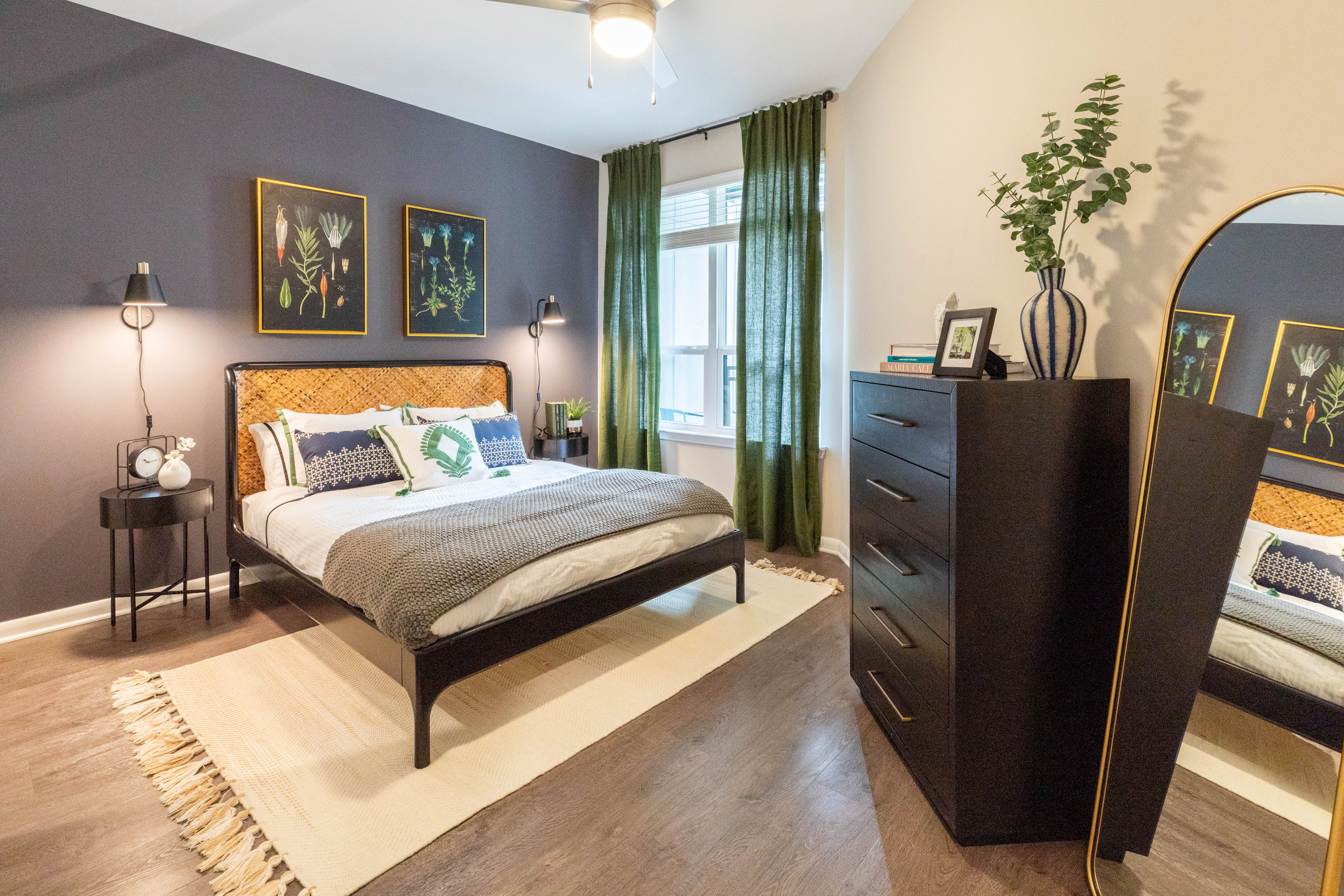 Model bedroom with dark accents The Jade at Avondale in Decatur, Georgia