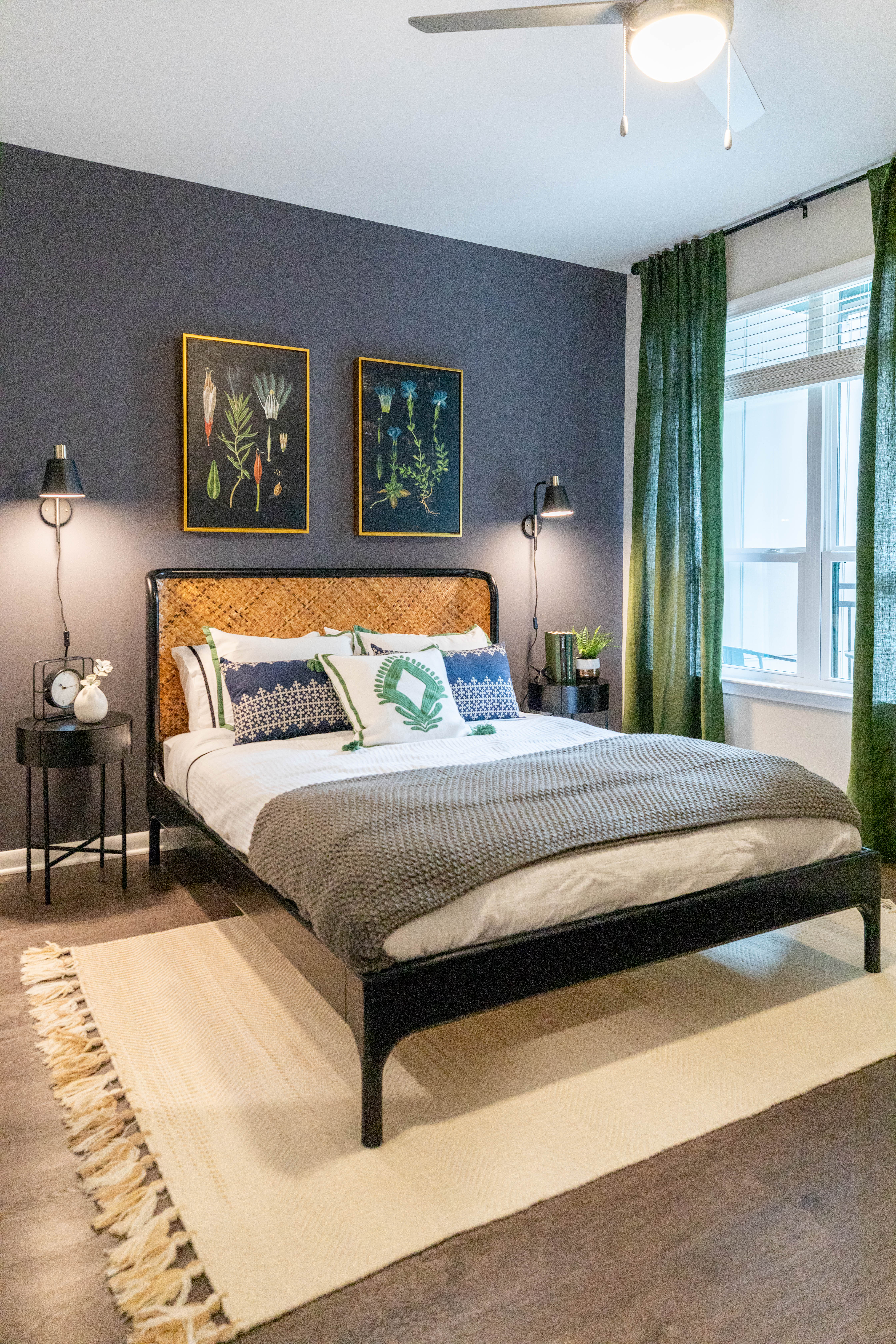 Model bedroom with large rug The Jade at Avondale in Decatur, Georgia
