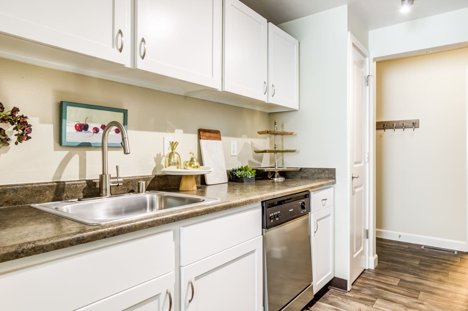 Kitchen with white accents at Alder Bellevue in Bellevue, Washington