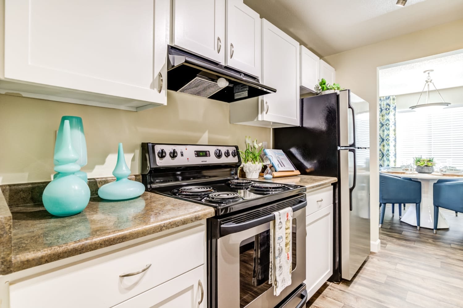 Kitchen with white cabinets at Alder Bellevue in Bellevue, Washington