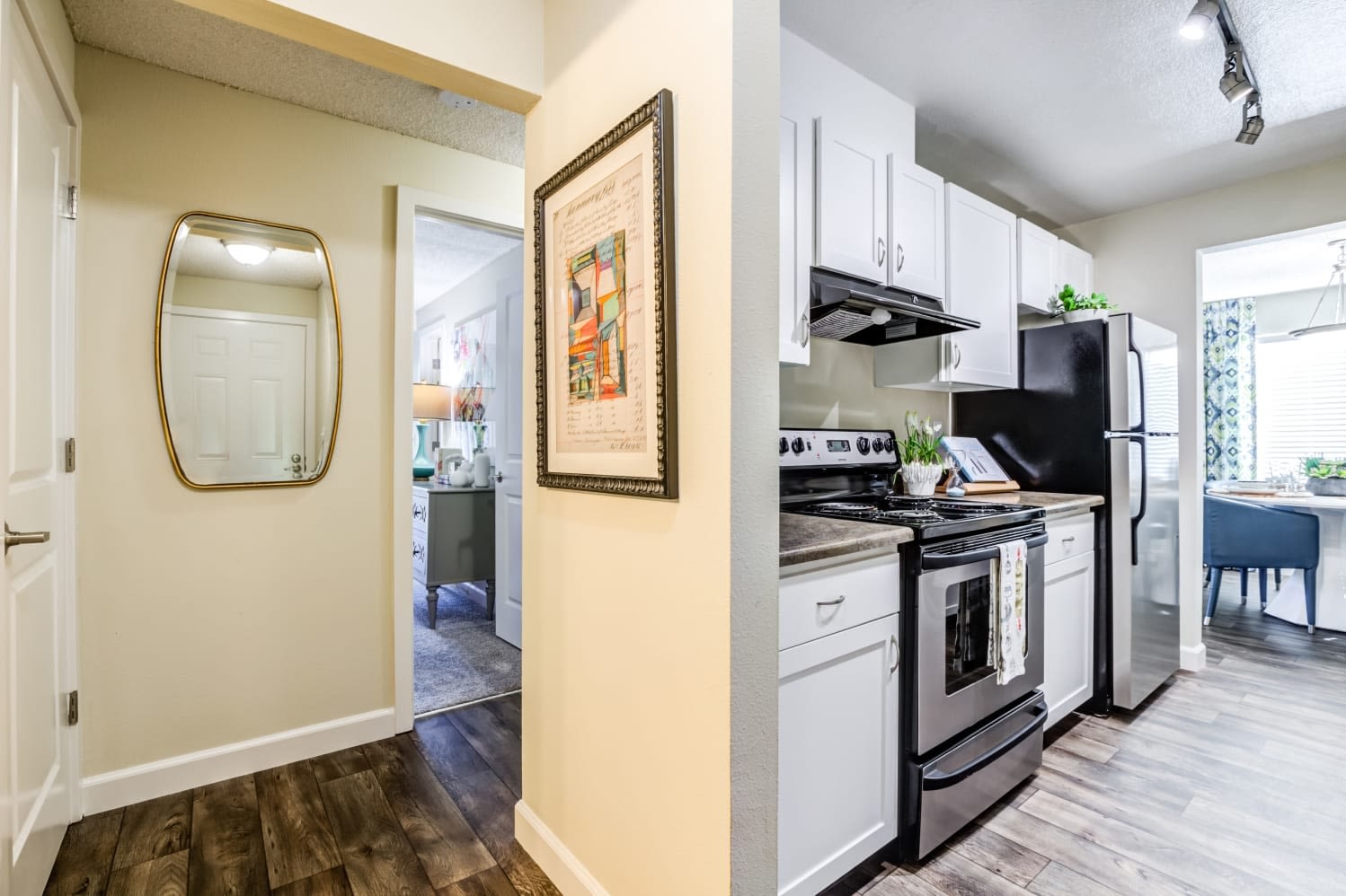 Kitchen with dark wood flooring at Alder Bellevue in Bellevue, Washington