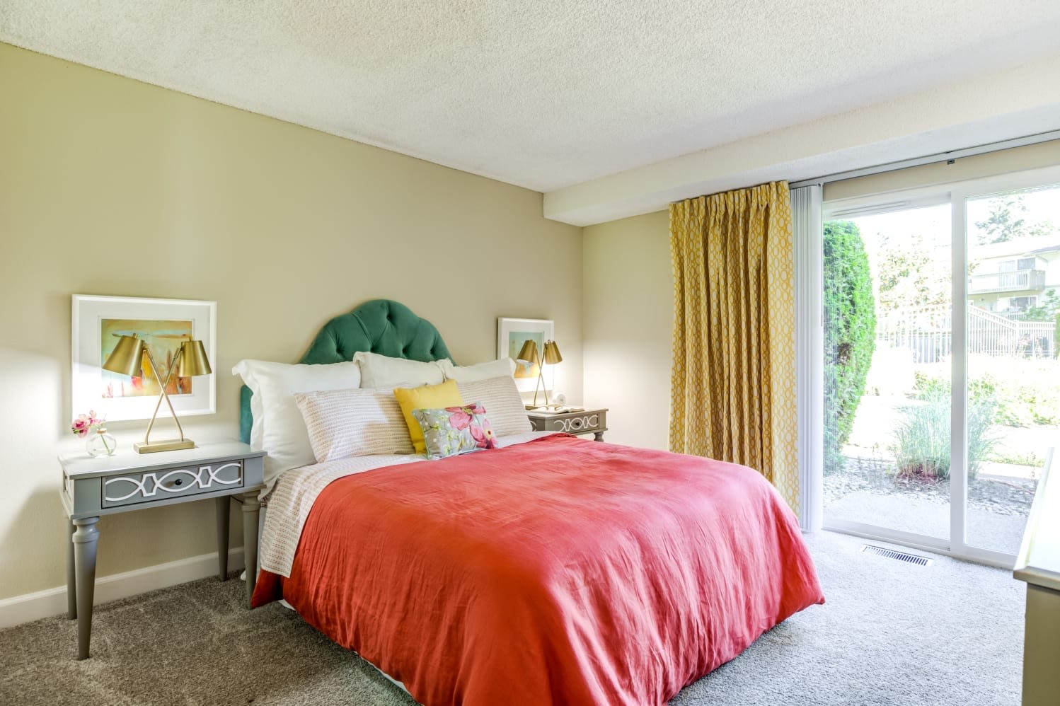 Bedroom with red accents Alder Bellevue in Bellevue, Washington