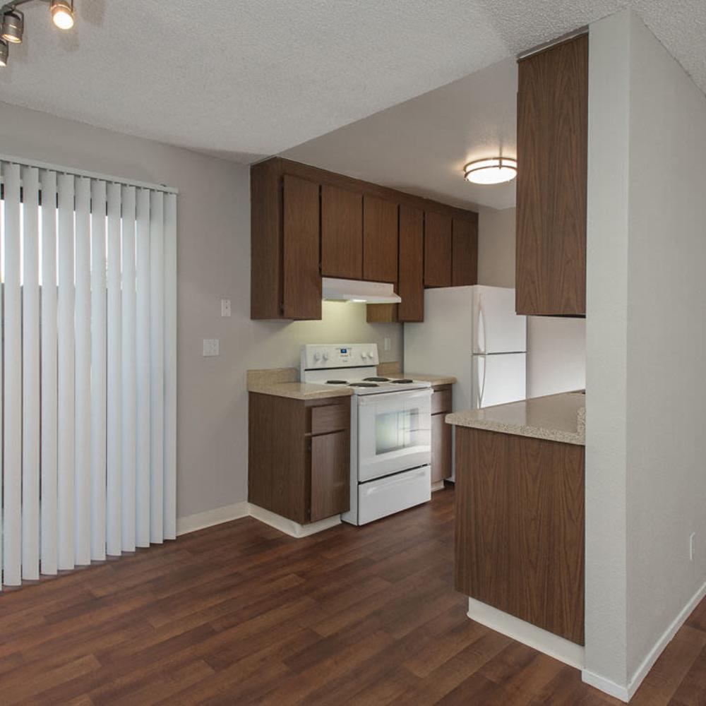 Kitchen with white appliances at Sheridan Park in Salinas, California