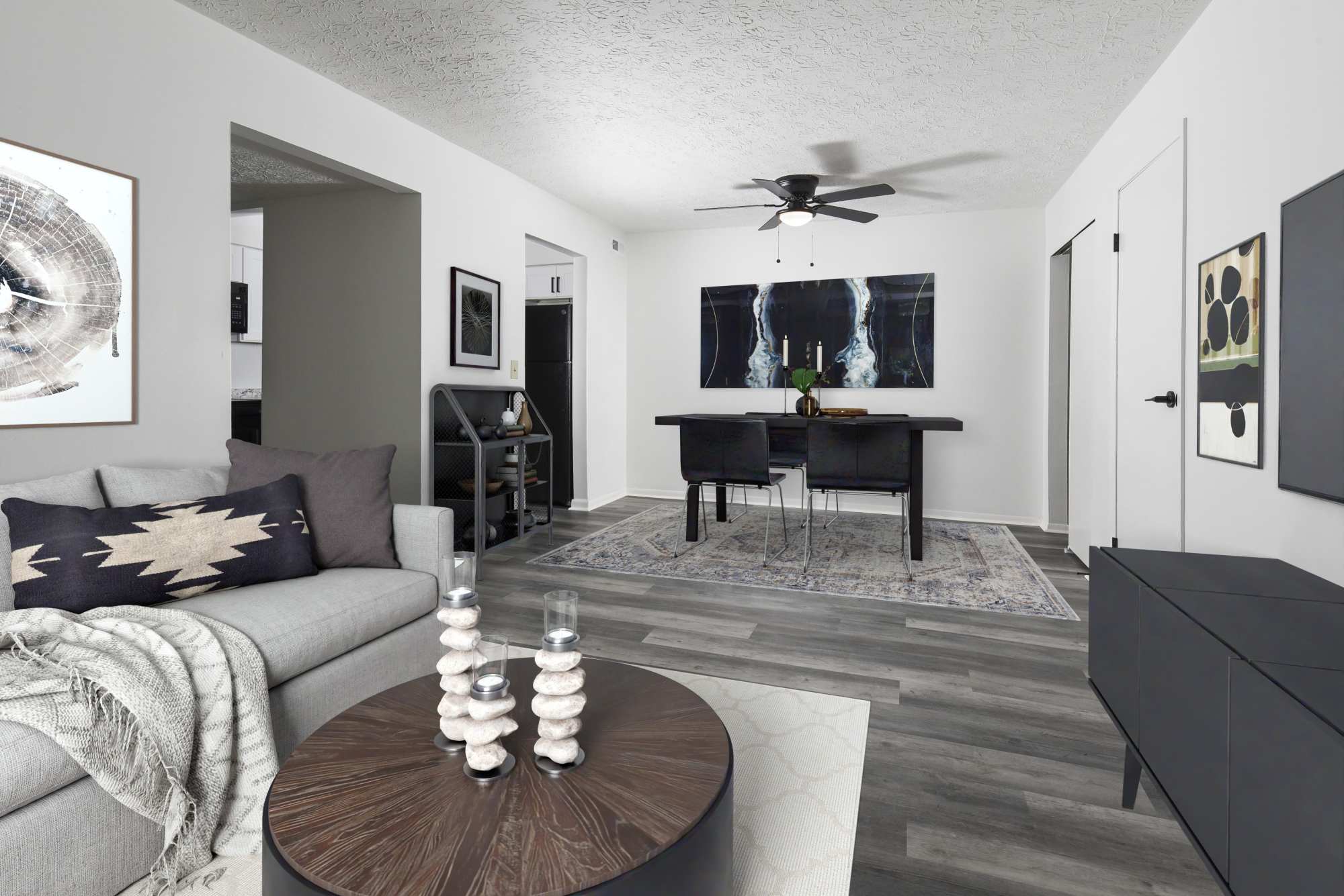 East living room with ceiling fan at Pointe at Northern Woods in Columbus, Ohio