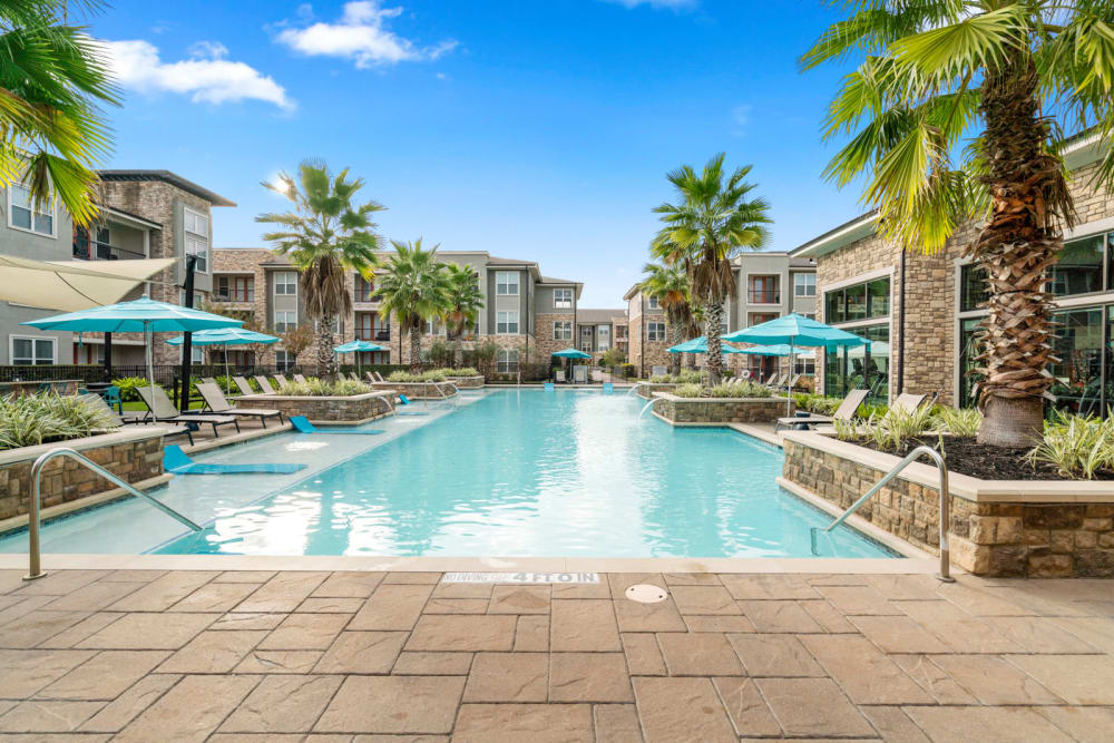 Sparkling pool at Olympus Grand Crossing in Katy, Texas