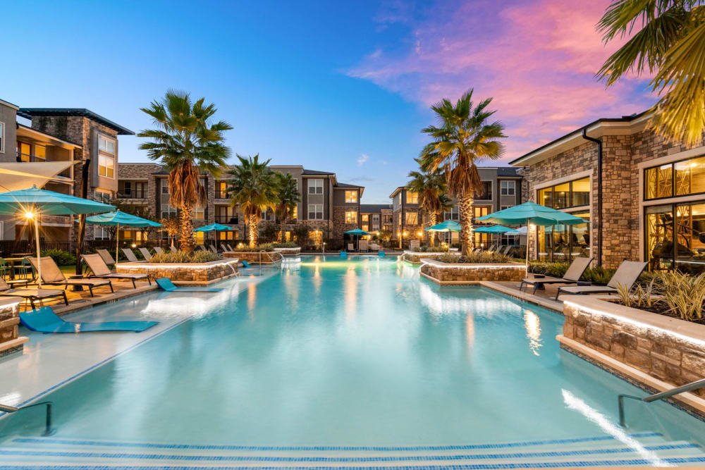 Resort-style pool at Olympus Grand Crossing in Katy, Texas