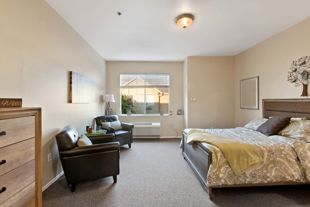 Cozy bedroom at Claremont Place in Claremont, California