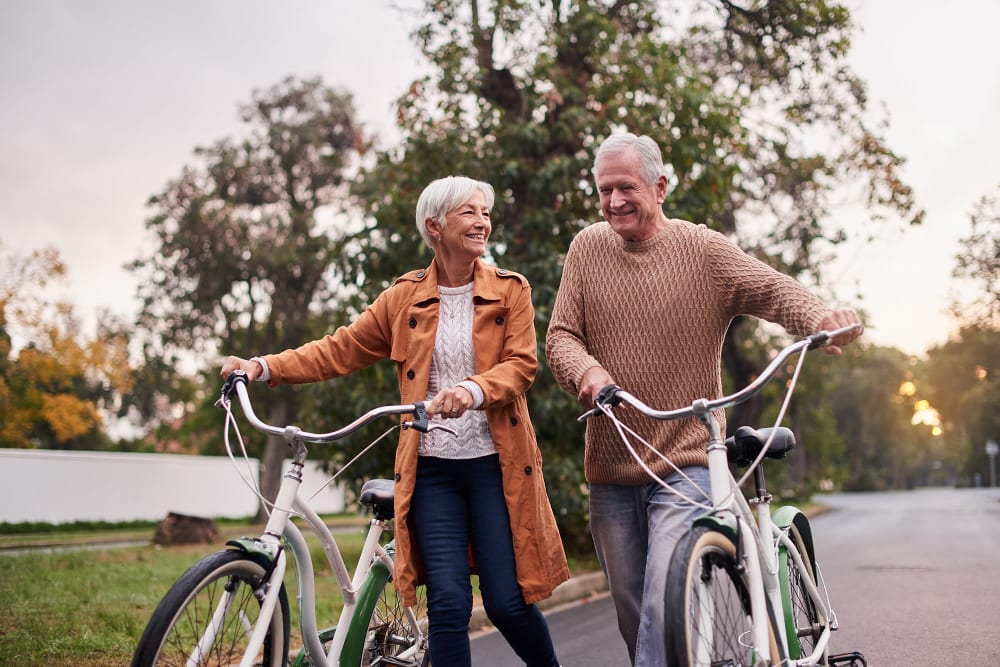 Residents walking their bikes near Laurel Hill Nursing Center in Grants Pass, Oregon