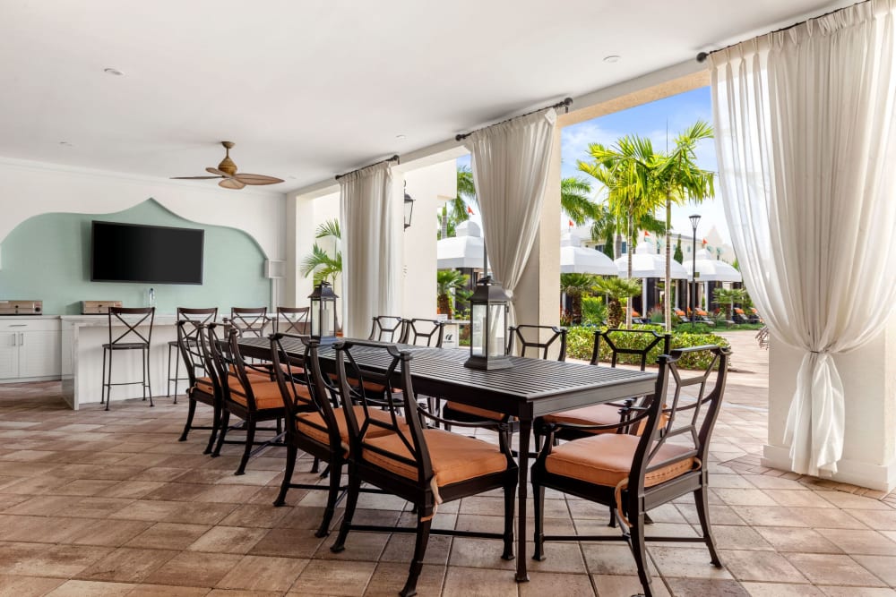 Outdoor dining table at Oceanside Lantana in Lantana, Florida