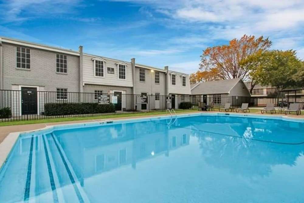 Large resort-style community swimming pool at Parkwyn Townhomes in North Richland Hills,Texas