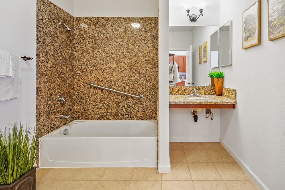 Bathroom with tub at Ponté Palmero in Cameron Park, California