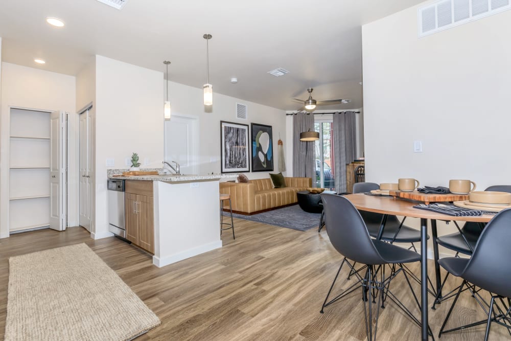 Spacious apartment with wood-style flooring at Trailside Apartments in Flagstaff, Arizona