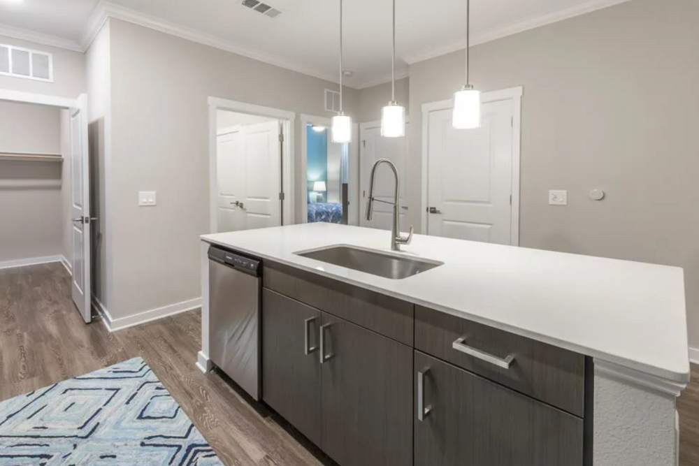 Spacious kitchen with quartz countertops at Verso Luxury Apartments in Davenport, Florida