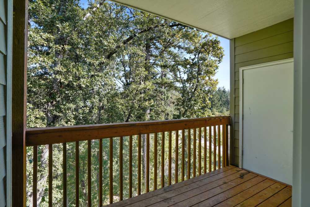 Apartment balcony overlooking the community at Springbrook Ridge Apartments in Newberg, Oregon