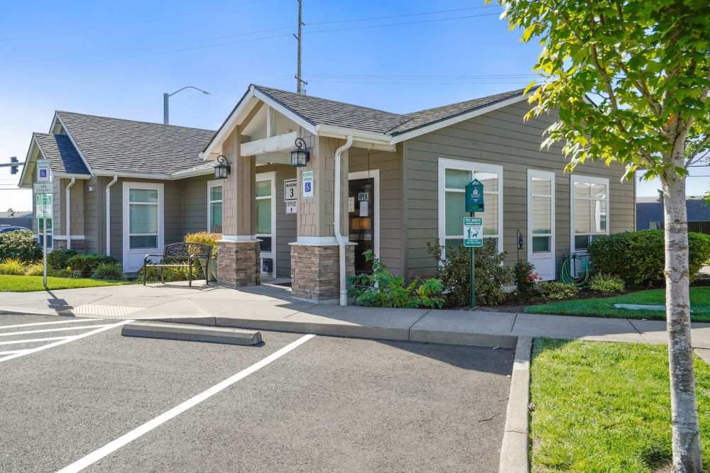 Leasing center parking lot outside at Springbrook Ridge Apartments in Newberg, Oregon