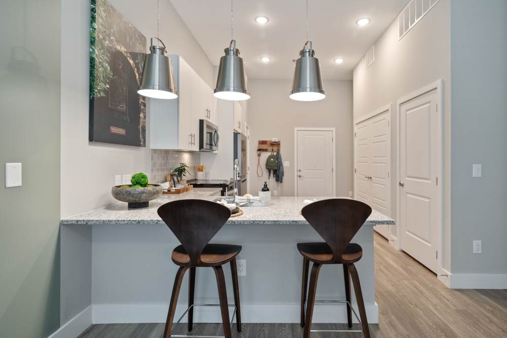 Kitchen island with pendant lighting at 101 Depot in Smyrna, Tennessee