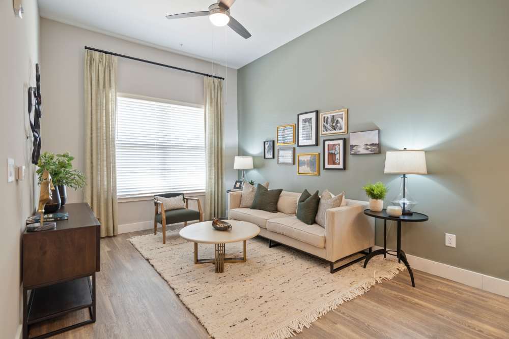 Living room with a ceiling fan at 101 Depot in Smyrna, Tennessee