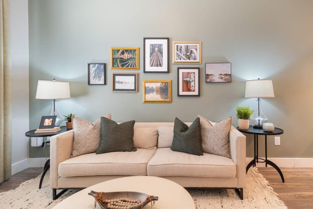 Cozy living room with wood-style flooring at 101 Depot in Smyrna, Tennessee