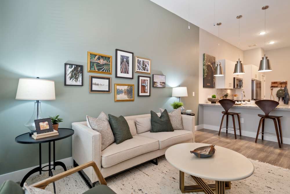 Living room and kitchen with wood-style flooring at 101 Depot in Smyrna, Tennessee