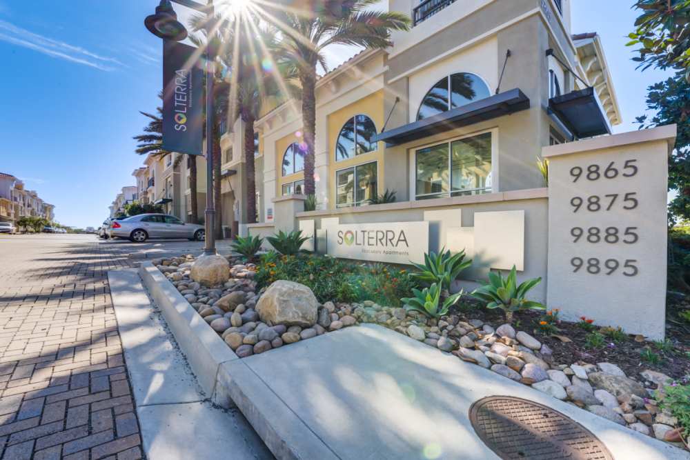 Palm trees outside building at Solterra in San Diego, California