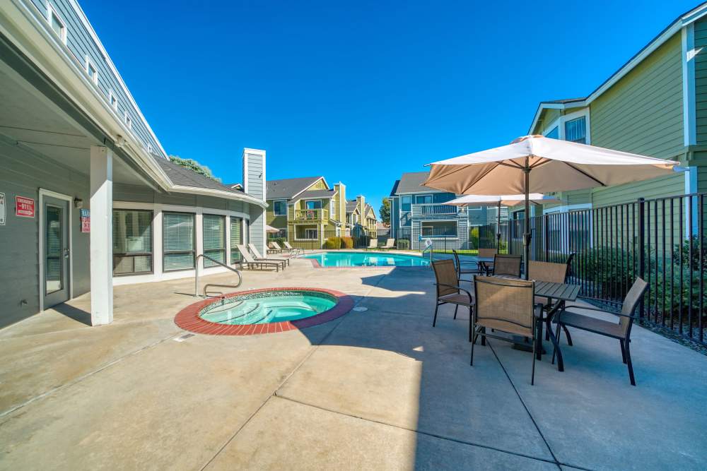 Community pool with a hot tub at Bristle Pointe Apartments in Reno, Nevada