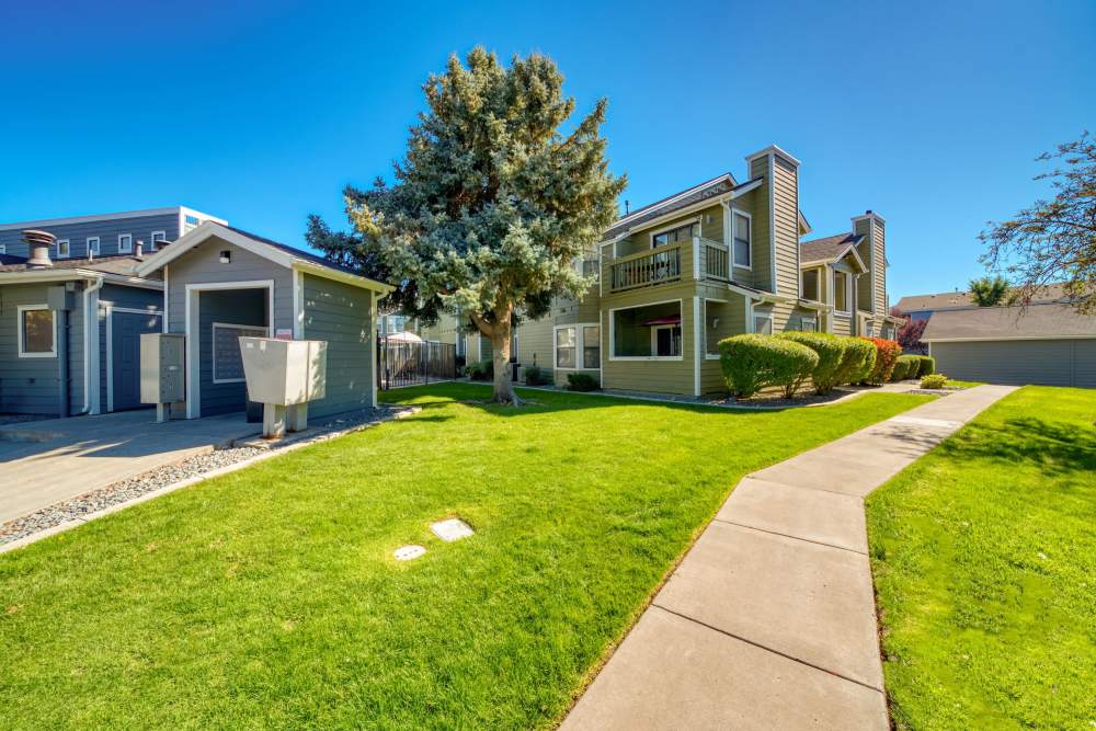 Exterior of apartment with pathway at Bristle Pointe Apartments in Reno, Nevada