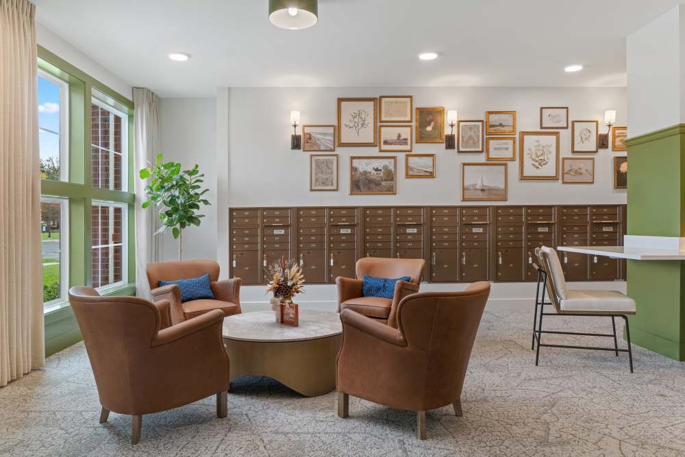 Mail room with seating at Lake Forest at Swift Creek in Midlothian, Virginia