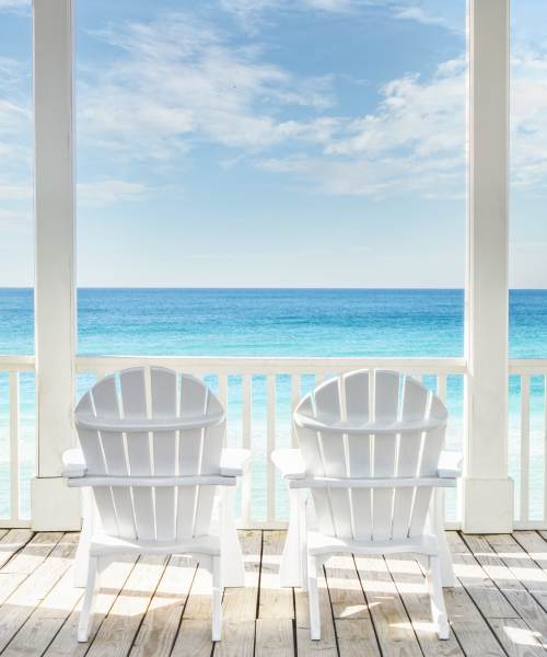 Deck chairs overlooking the ocead near Artisan Living North Beach in Santa Rosa Beach, Florida