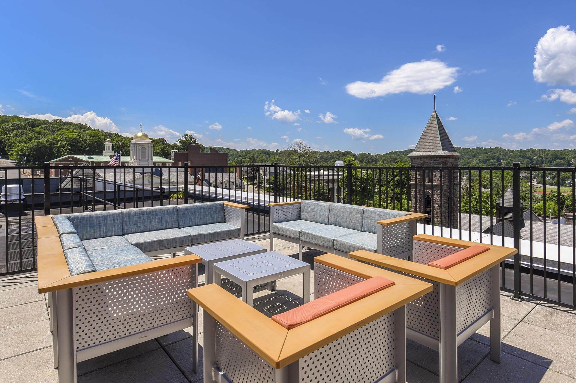 Rooftop lounge with chairs and tables at The Monroe, Morristown, New Jersey