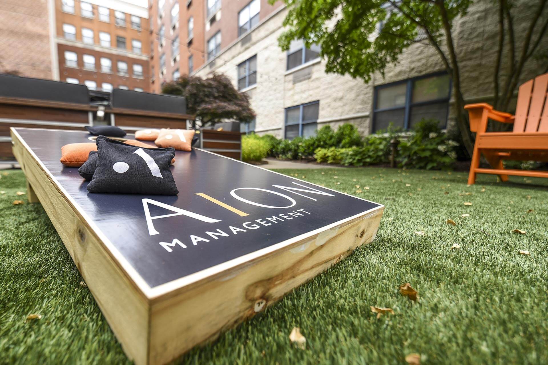 Cornhole in the resident courtyard at The Monroe in Morristown, New Jersey