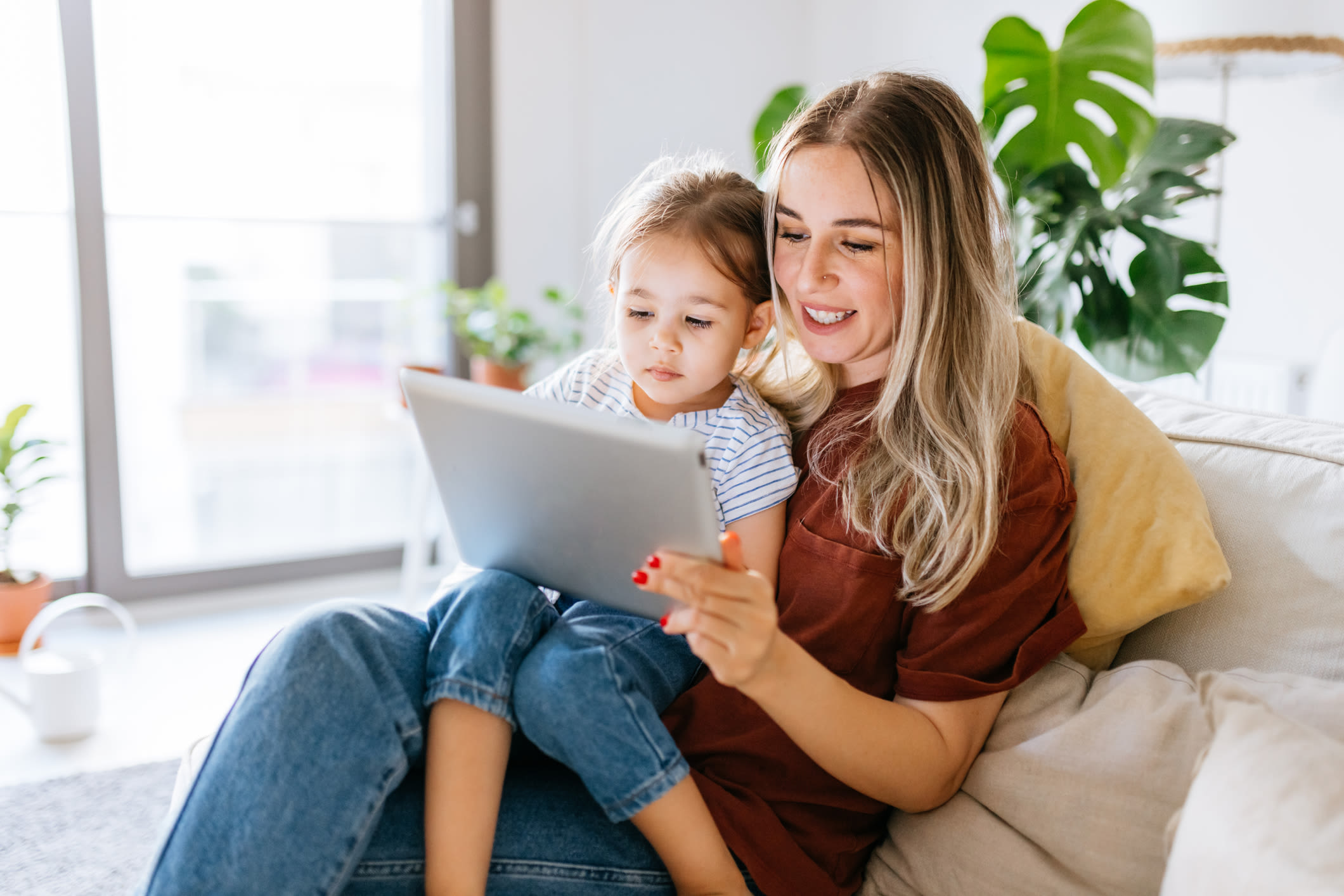 Resident reading to her child at Franklin Commons in Bensalem, Pennsylvania