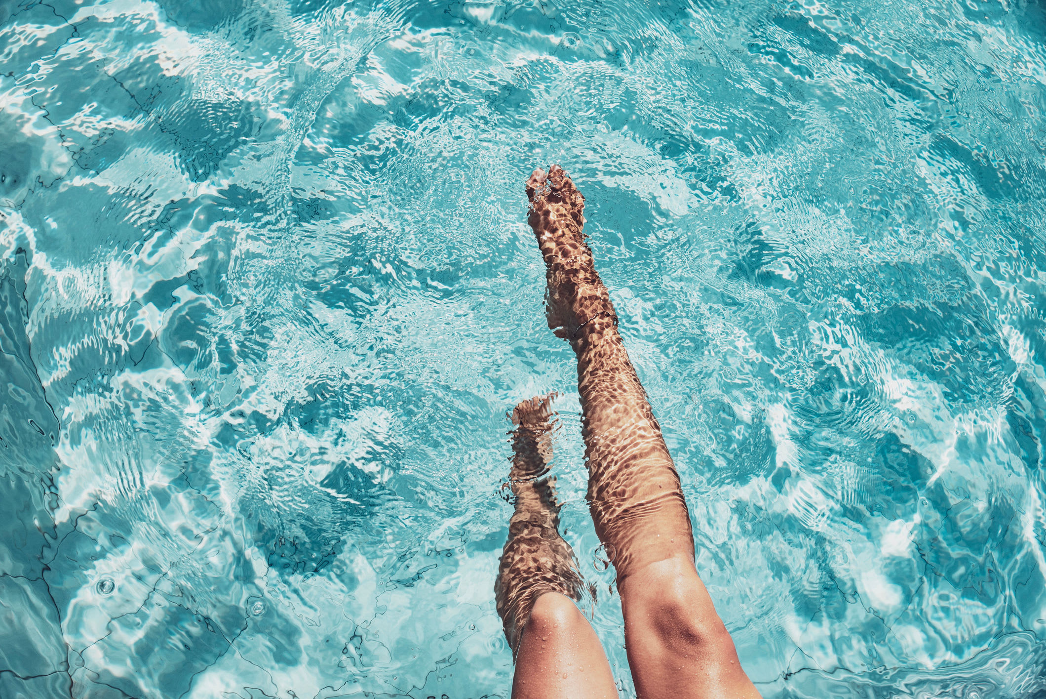 Legs in a swimming pool at Lehigh Square in Allentown, Pennsylvania