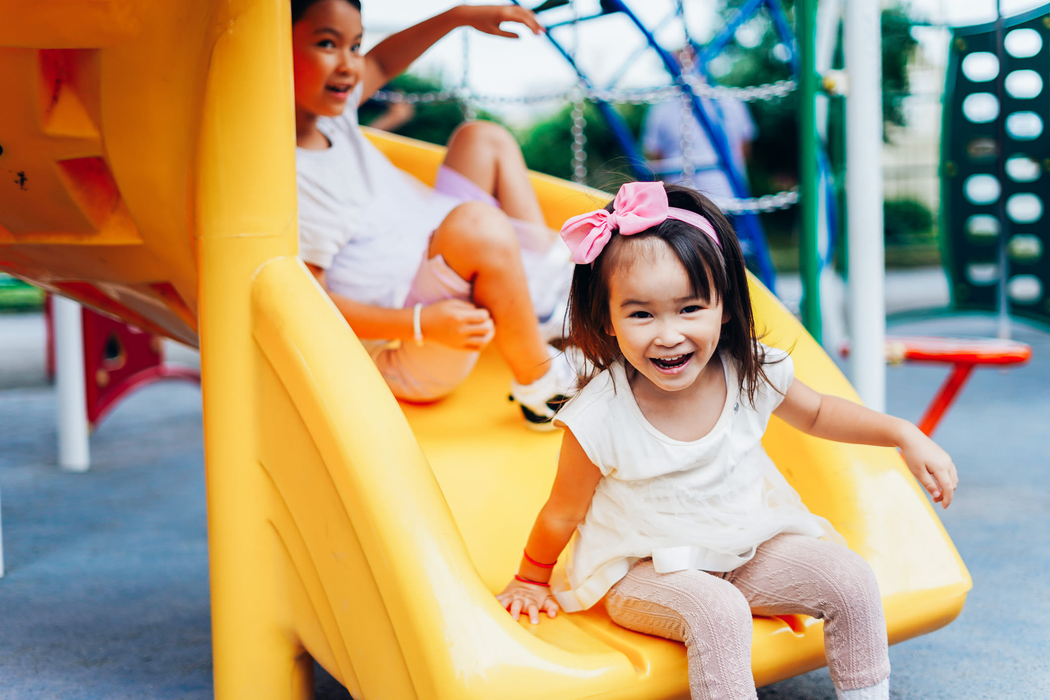 children playing on a slide at Orchard Park in Edgewater Park, New Jersey