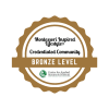 Montessori Inspired Lifestyle award badge for Merrill Gardens at Wright Park, in Tacoma, Washington