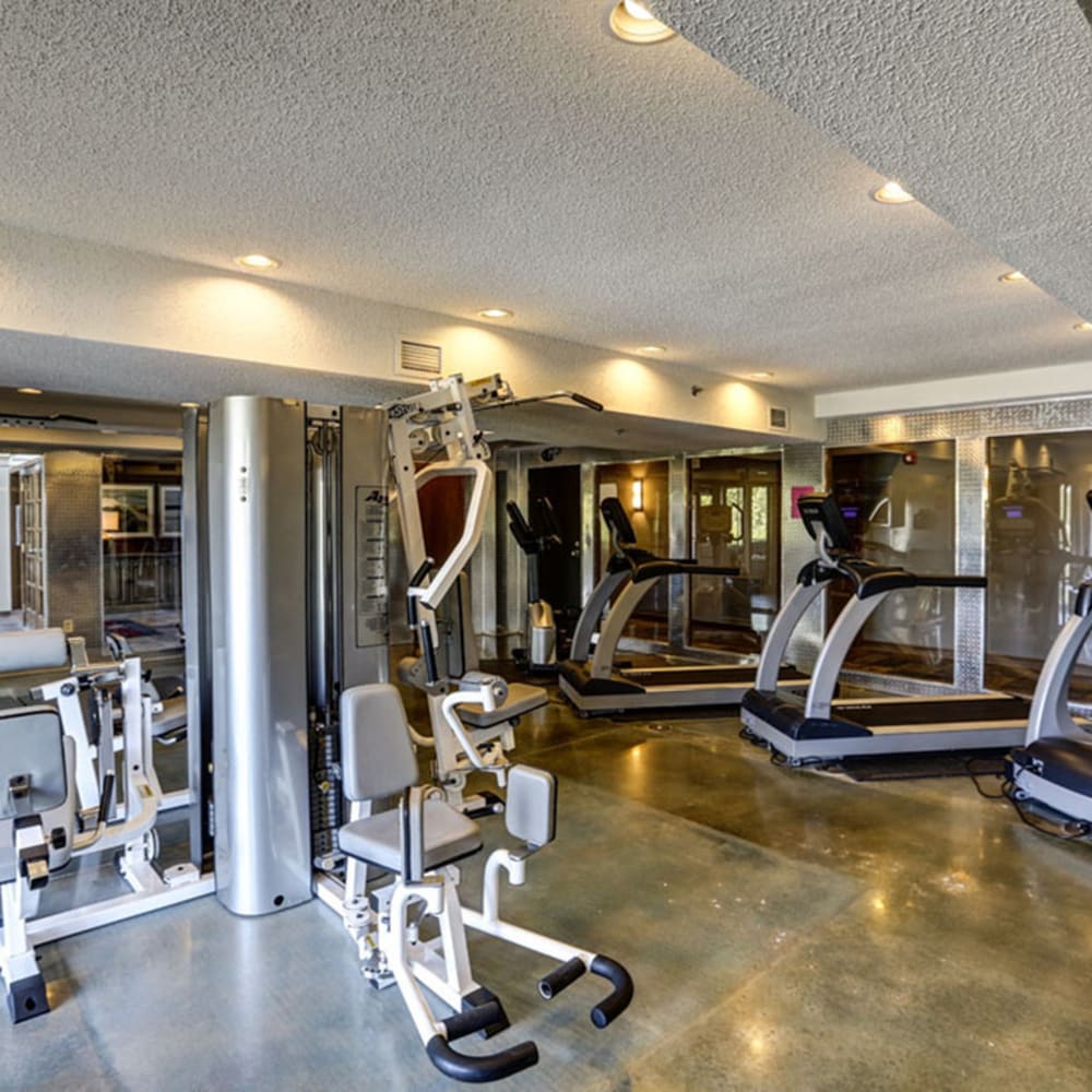 Fitness center with cardio equipment at The Falls in Mission, Kansas