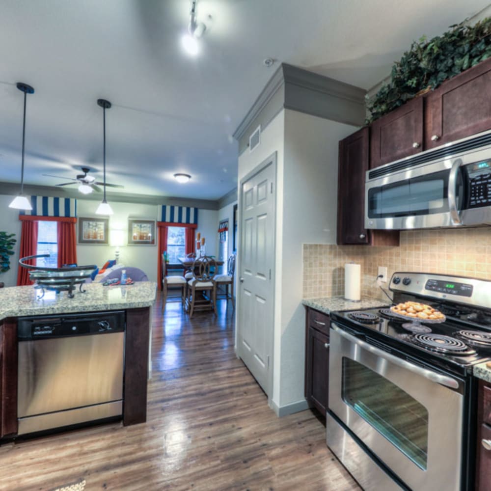 Kitchen with cabinet at Avenues at Shadow Creek Ranch in Pearland, Texas