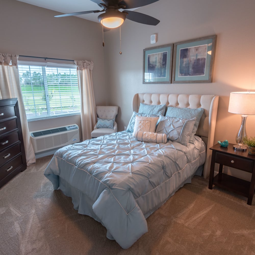 A resident bedroom at Inspired Living in Royal Palm Beach, Florida