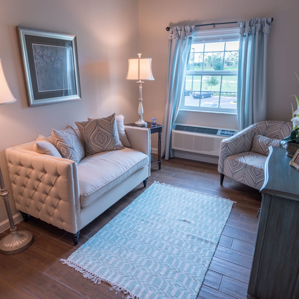 Studio apartment living room at Inspired Living in Royal Palm Beach, Florida