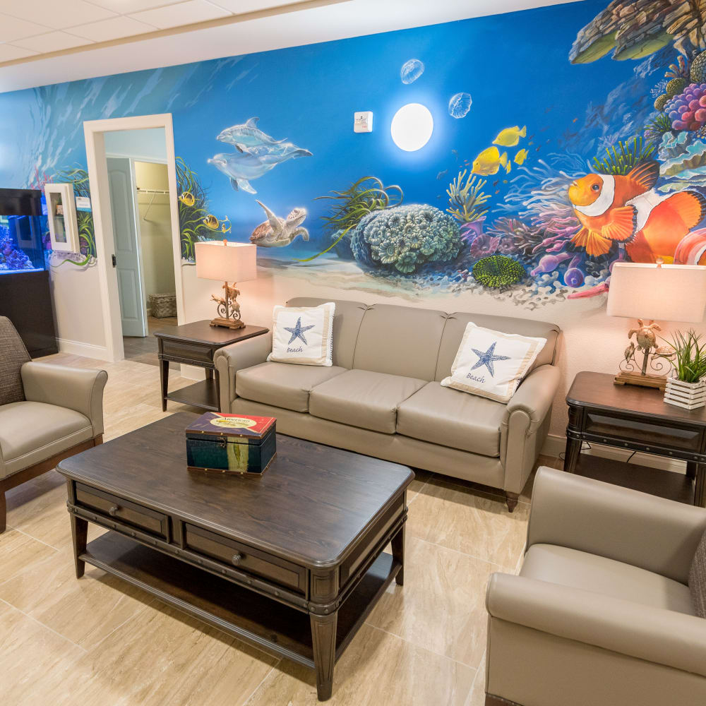 Coffee table next to comfortable seating at Inspired Living in Royal Palm Beach, Florida