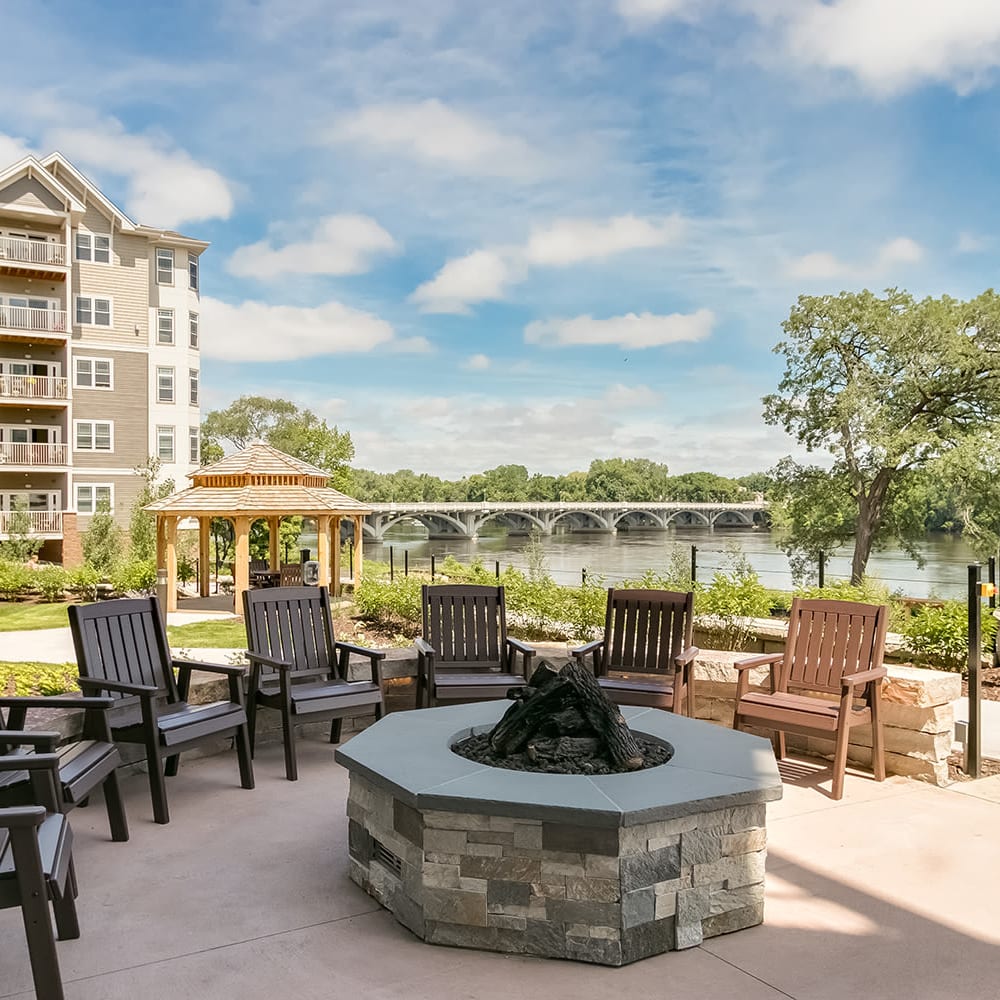 Fire pit at Applewood Pointe of Champlin at Mississippi Crossings in Champlin, Minnesota. 