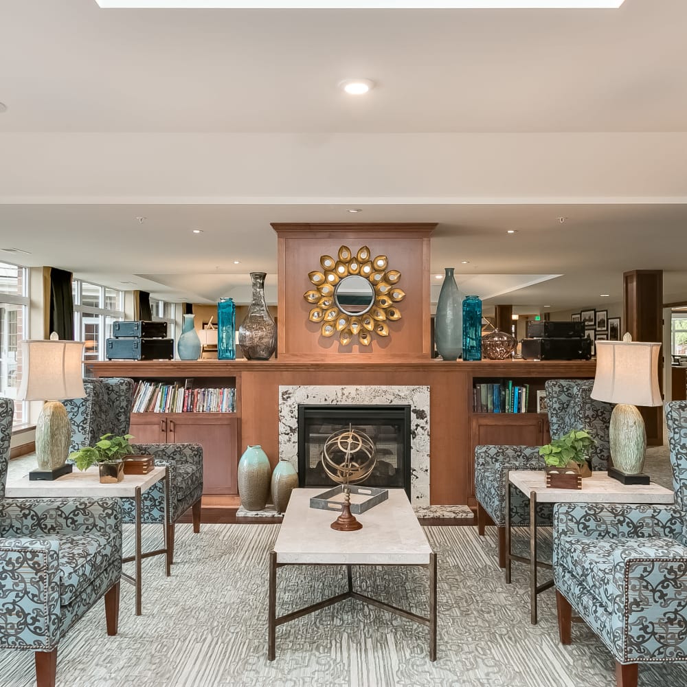 Lobby with a fireplace at Applewood Pointe of Minnetonka in Minnetonka, Minnesota. 