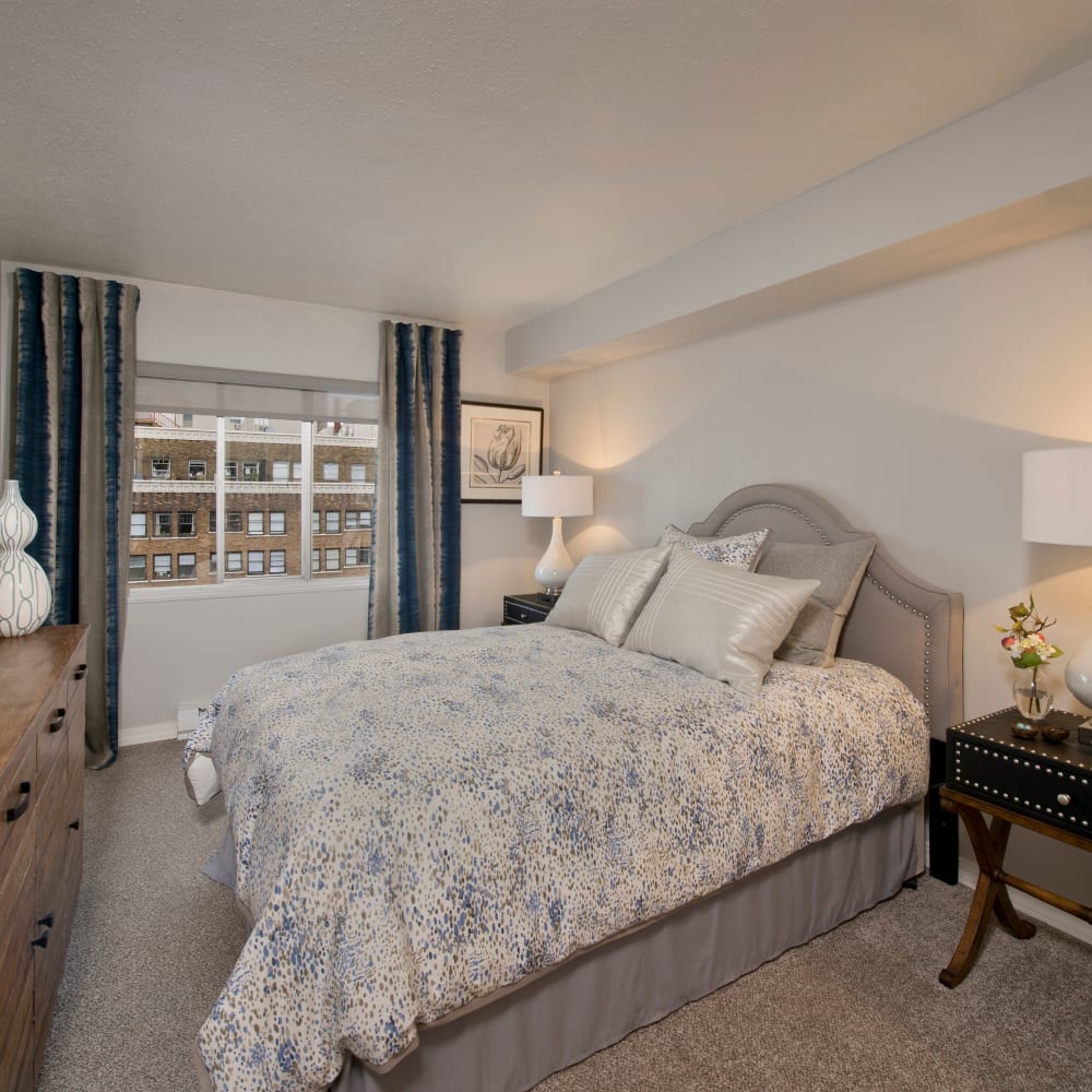 Master bedroom with a city view at The Mill at First Hill in Seattle, Washington
