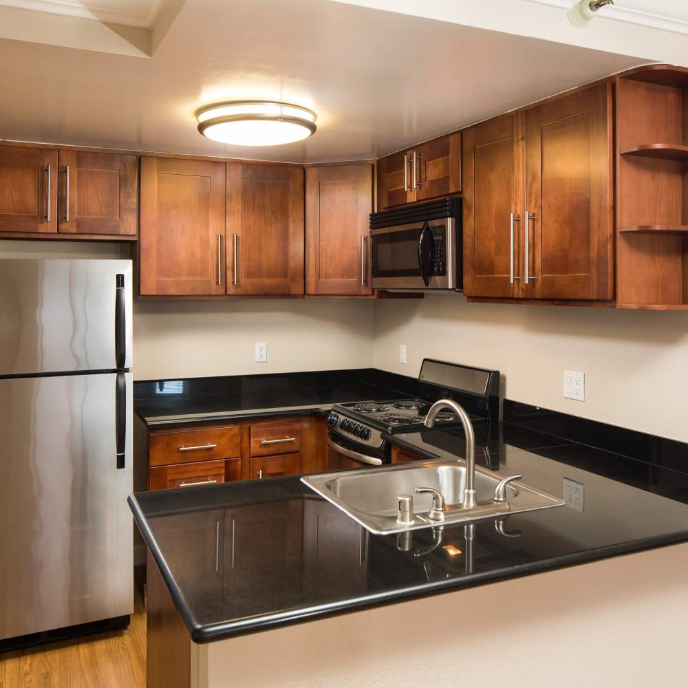 Kitchen with stainless-steel appliances and plenty of counter space at Tower 737 Condominium Rentals in San Francisco, California