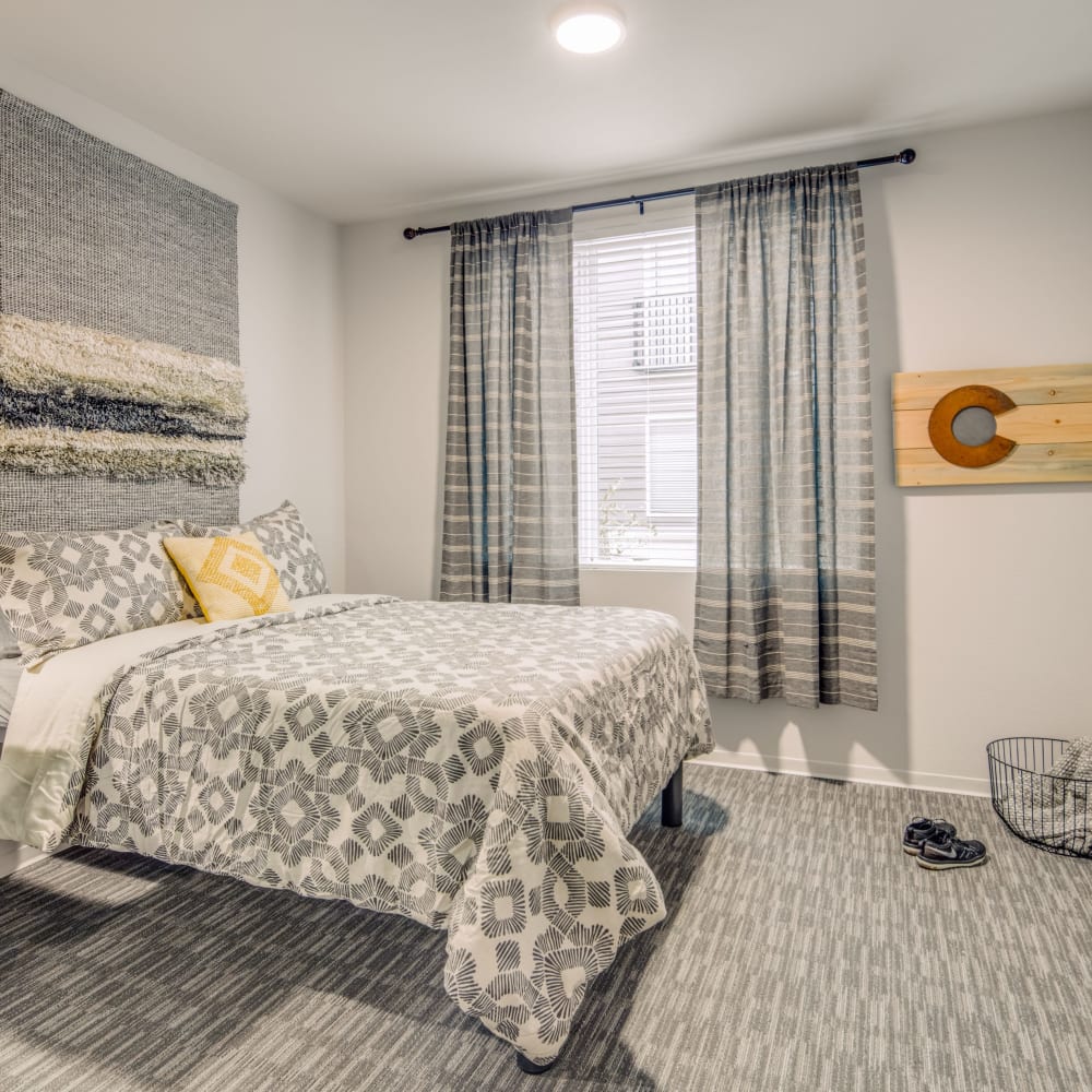 Bright bedroom at UNCOMMON Fort Collins in Fort Collins, Colorado