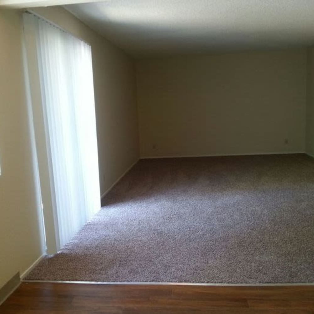 Living room and balcony door at Amber Park in Sacramento, California