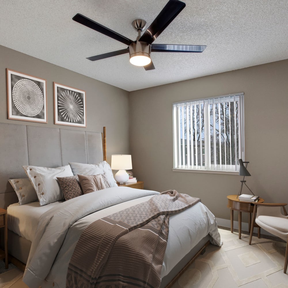 Bedroom with ceiling fan at The Hawthorne in Carmichael, California