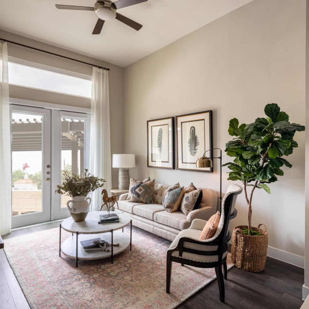 Ceiling fan and hardwood floors in the living area of a model home at Magnolia Heights in San Antonio, Texas