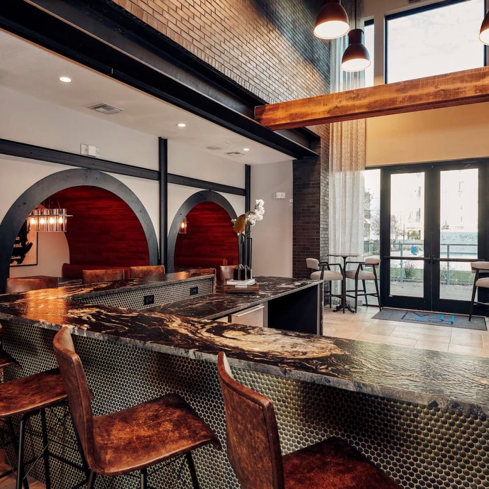 Bar seating at the resident clubhouse kitchen at The Guthrie in Austin, Texas